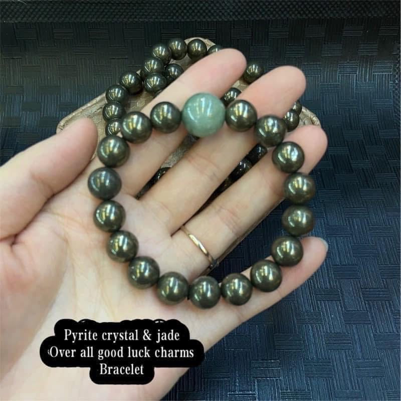 Pyrite crystal & jade over all good luck 
Charm bracelet  size 7.5