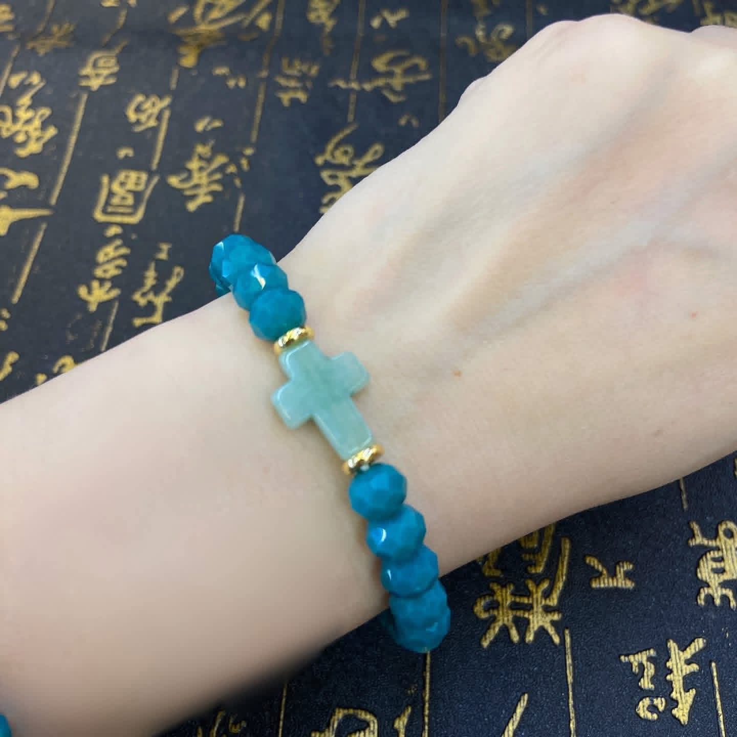 Jade faith cross with Transformative  teal bracelet