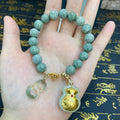 Money pao & Burma jade over all good charms bracelet