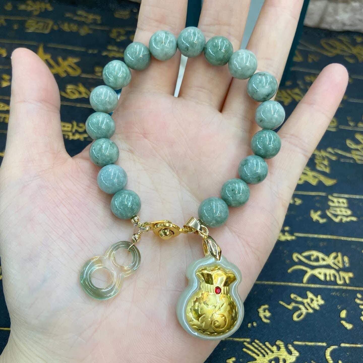 Money pao & Burma jade over all good charms bracelet