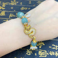 WEALTH DRAGON W/ JADE OVER ALL GOOD LUCK BRACELET