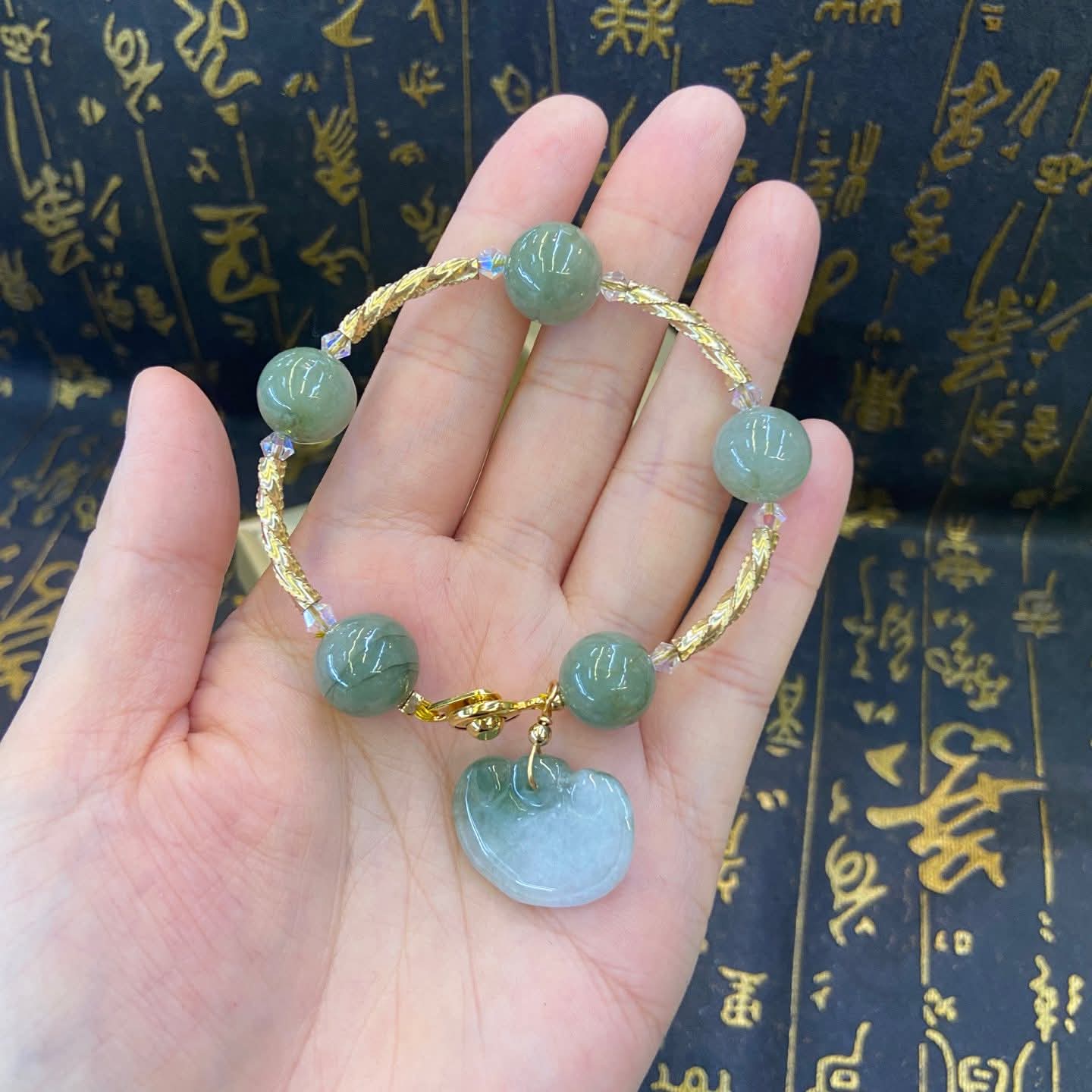 JADE W/ HEART OVER ALL GOOD LUCK

CHARM BRACELET 

JADE