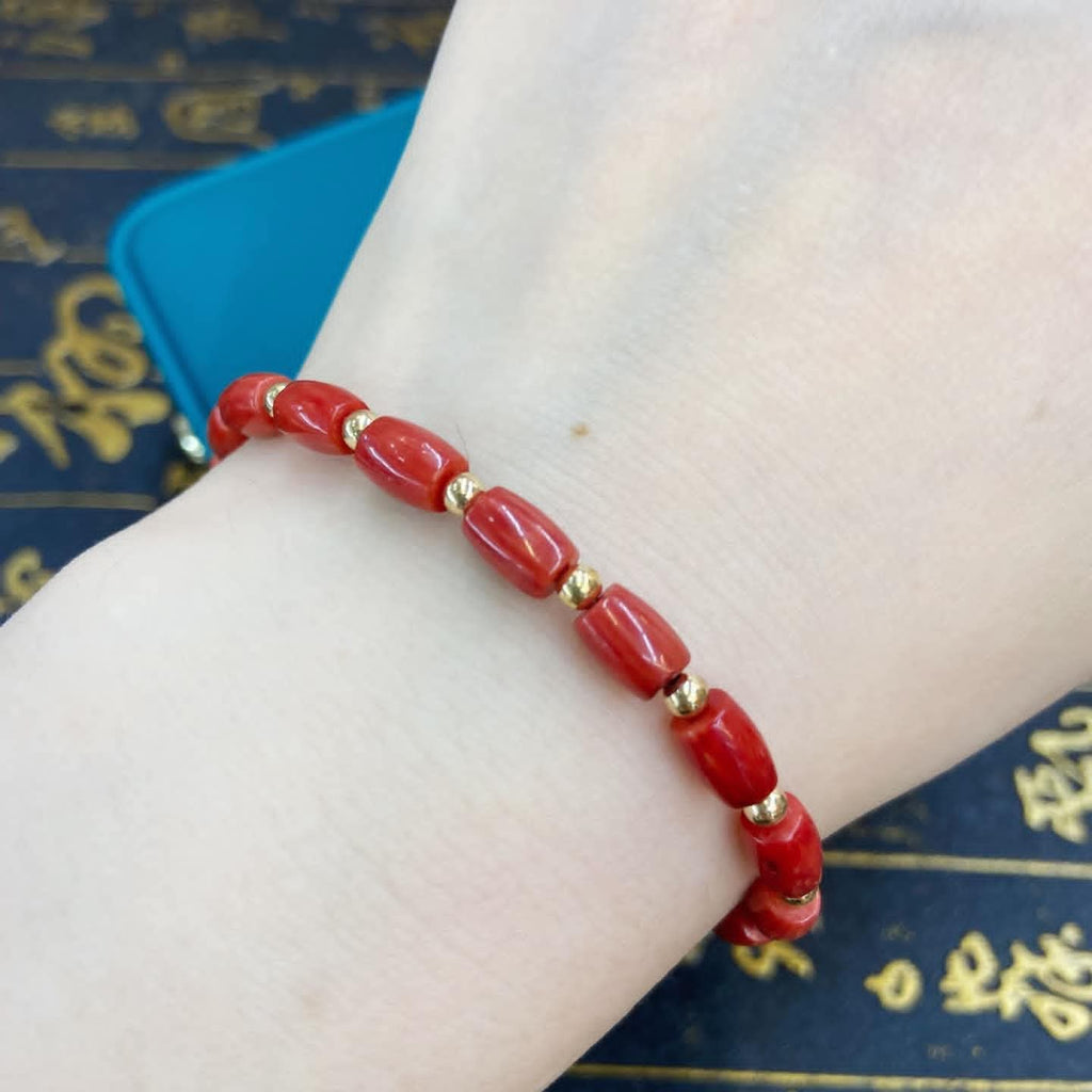 Taiwan corales & 10k gold lucky charm

Bracelet
