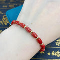 Taiwan corales & 10k gold lucky charm

Bracelet