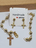 10k us gold cross earrings and bracelet